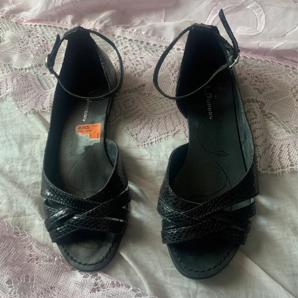 black snakeskin flats